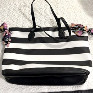 Large tote. Black and white striped. Used very little. In great condition.